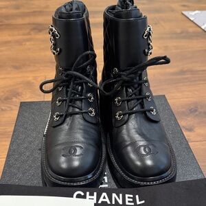 CHANEL Black Quilted Leather Lace-Up Combat Boots with Chain-Link Accents